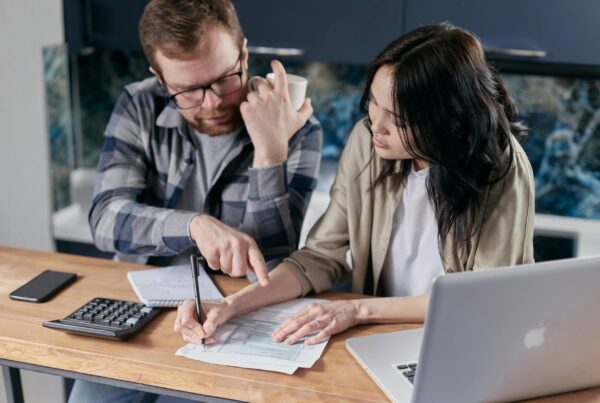 Free couple calculating al their bills stock photo